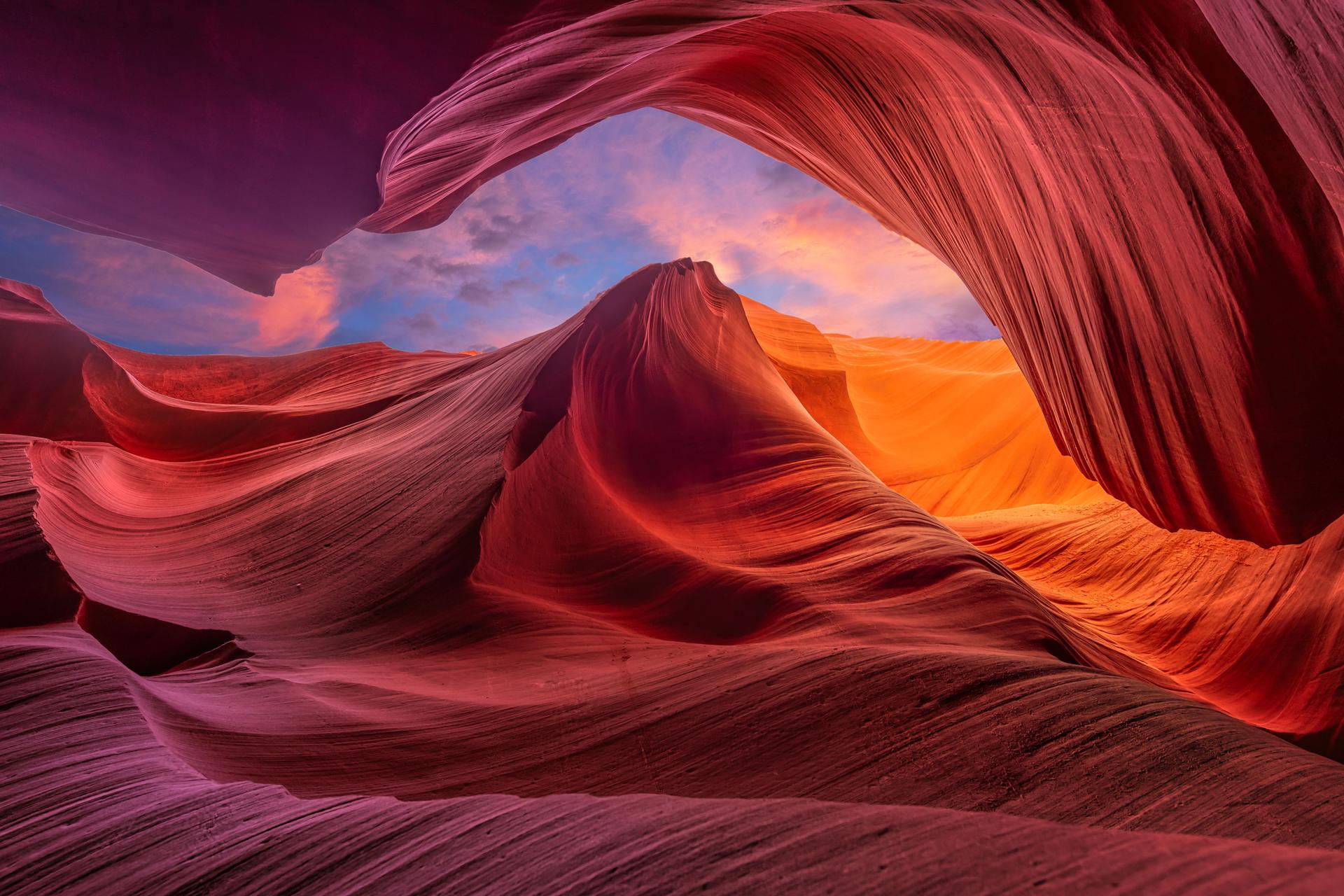 Vibrant sandstone formations in Antelope Canyon at sunset.